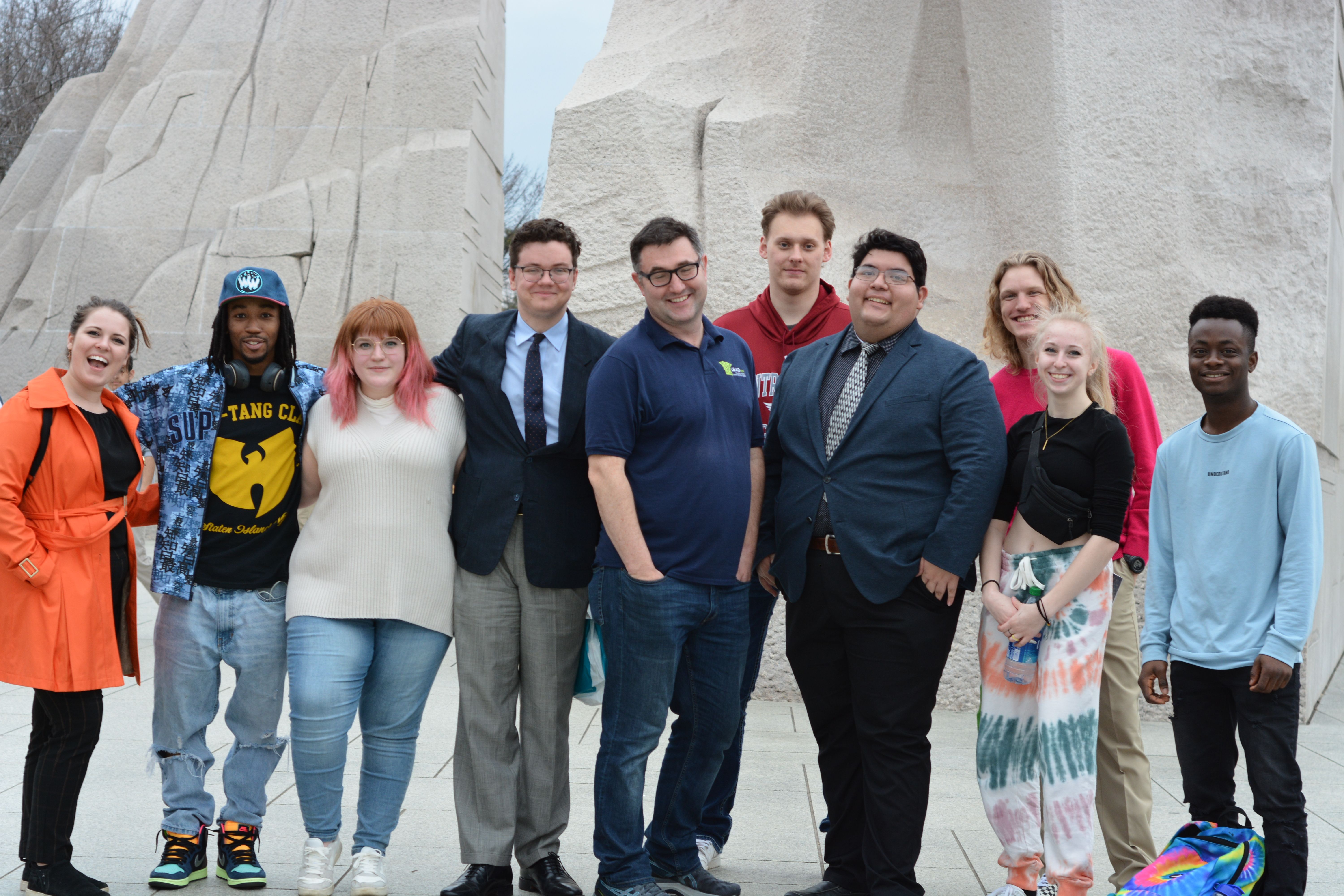 group of students at the Martin Luther King Jr memorial in Washington D.C.