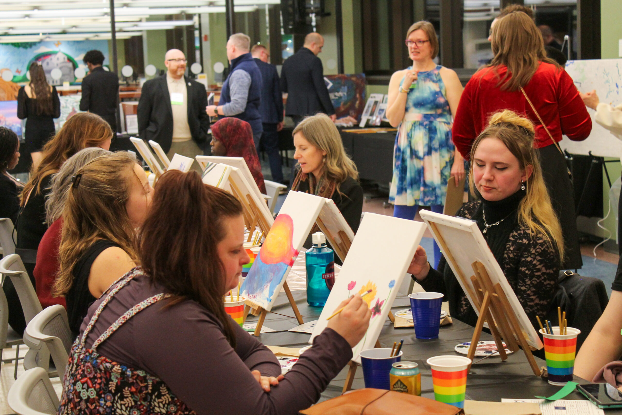 photo of students painting at the scholarship celebration