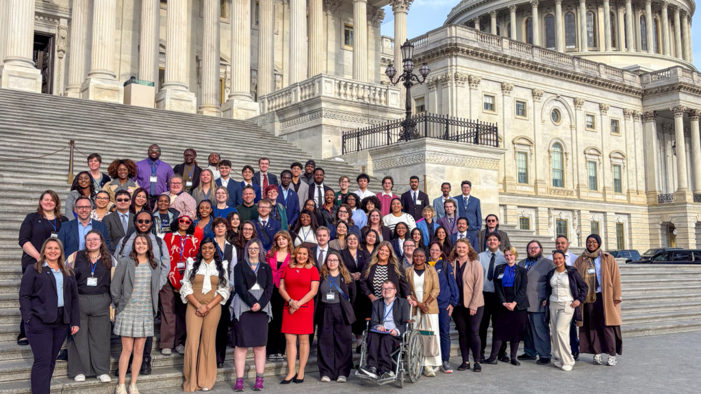 Group of college students in front of the house of representatives building in D.C.